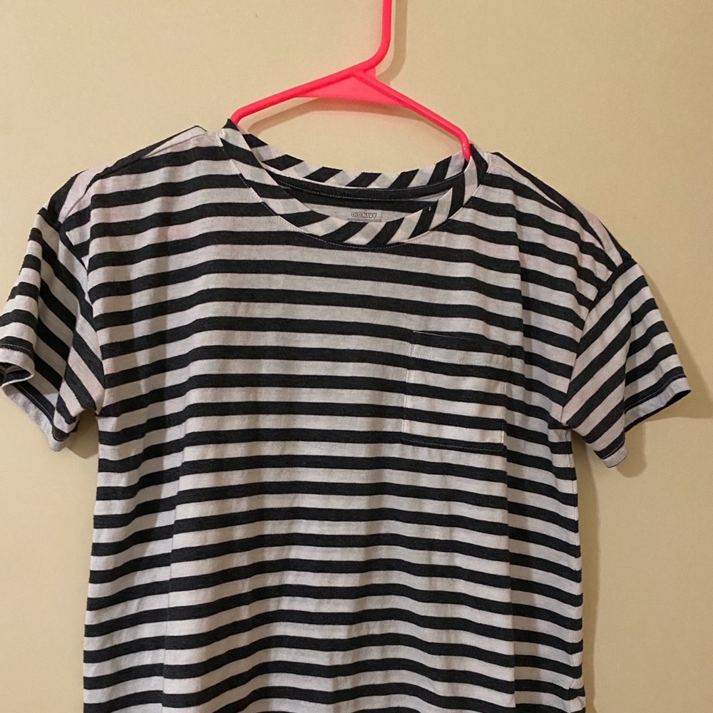 Old Navy short sleeved black and white striped top with pocket. Size girls L